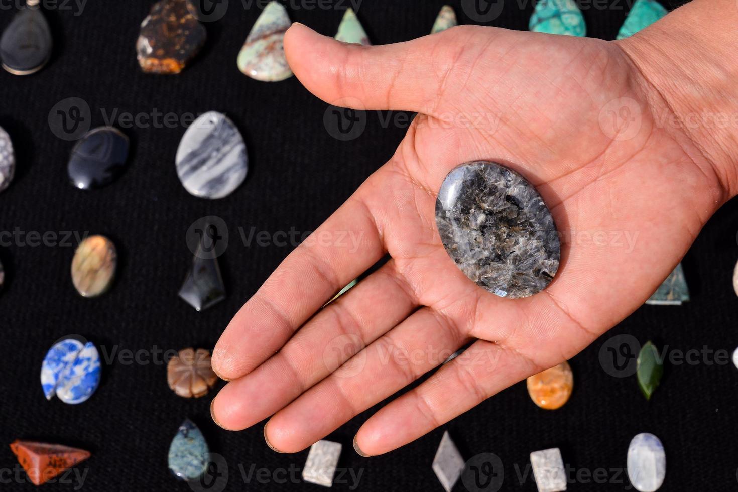 Gemstones on dark background photo