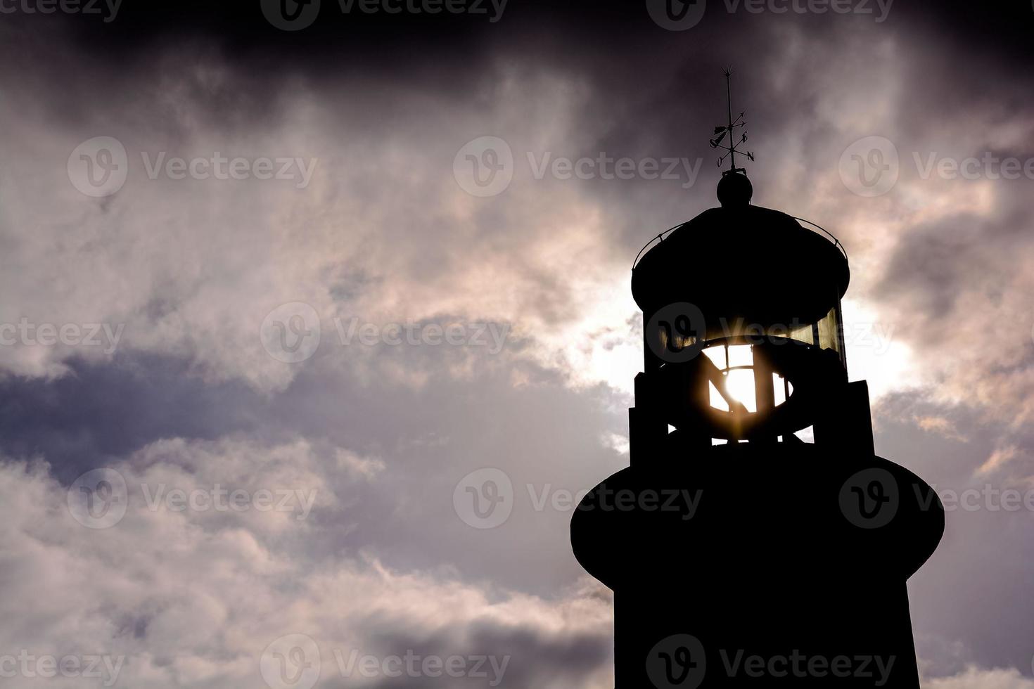 Lighthouse by the sea photo