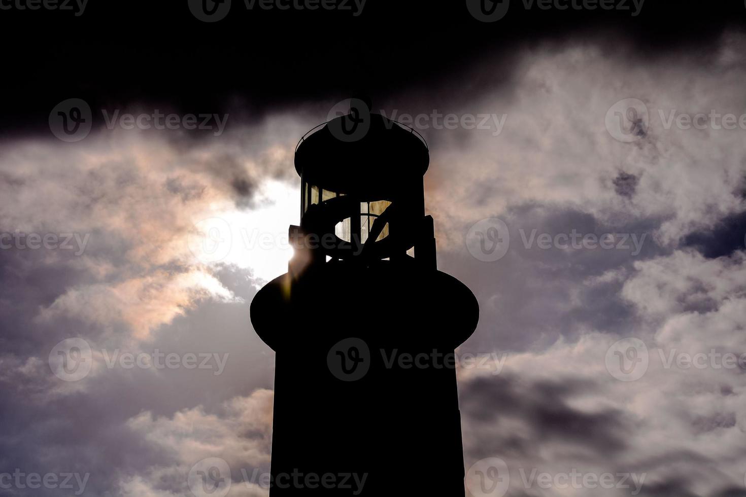 Lighthouse by the sea photo