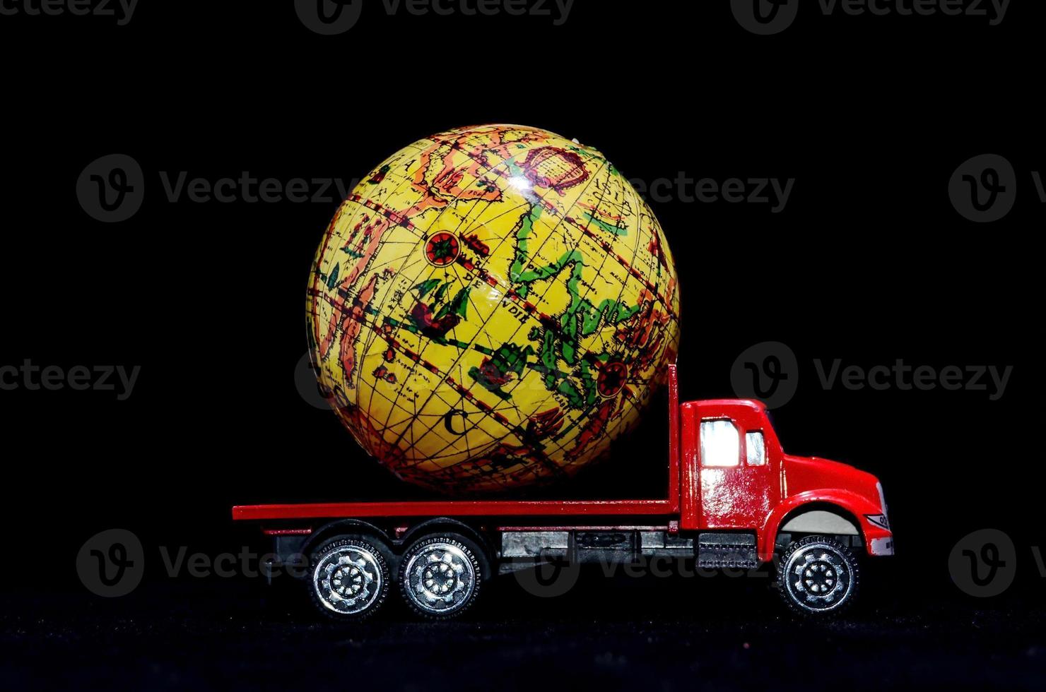 Toy truck with a globe photo