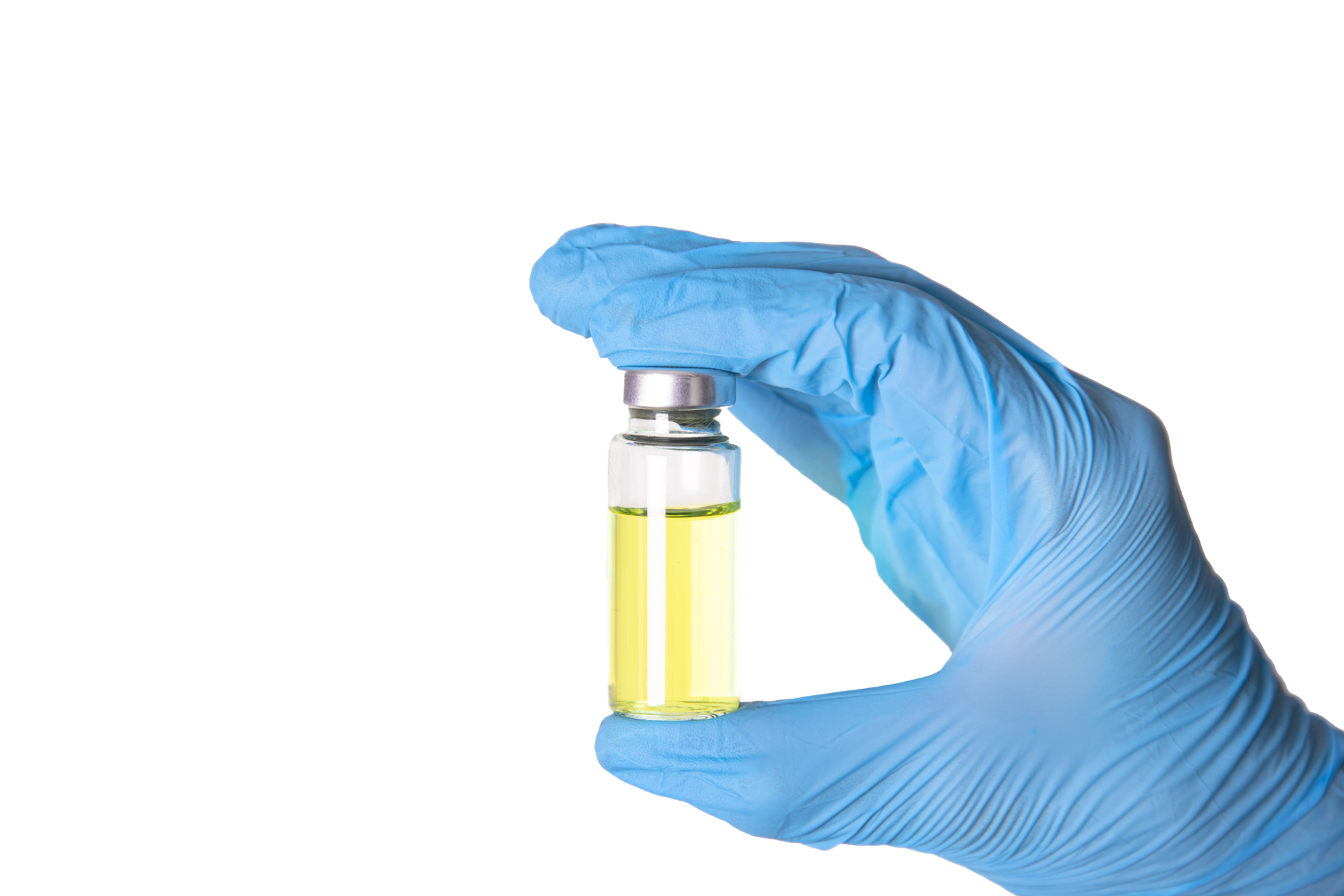 Free A doctor's hand in medical gloves holds a vaccine vial