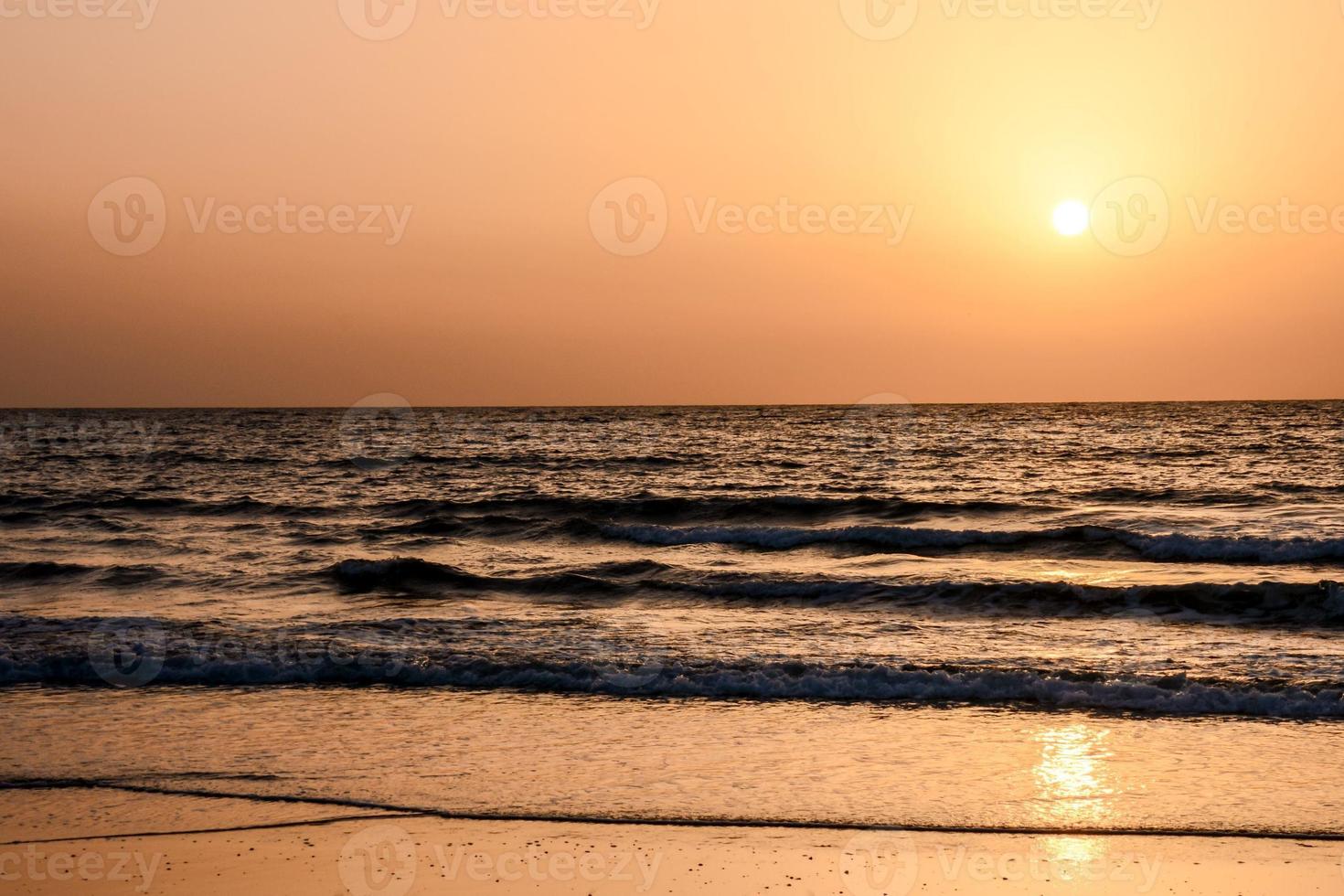 Sunset over the sea photo