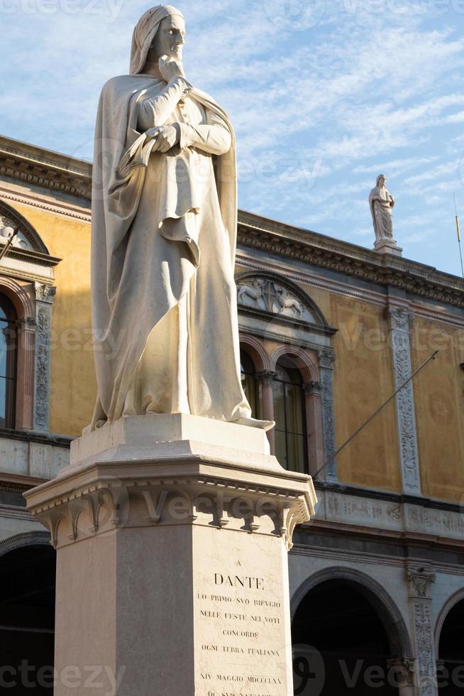 Verona, Italy - Dante Alighieri statue, famous poet old sculpture. photo