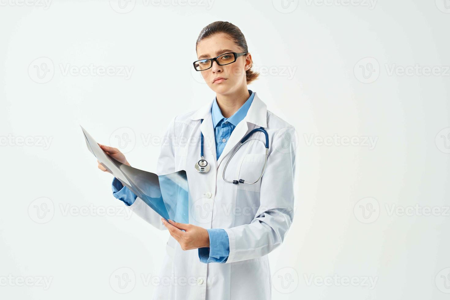 female doctor in white coat x-ray diagnostics laboratory research photo