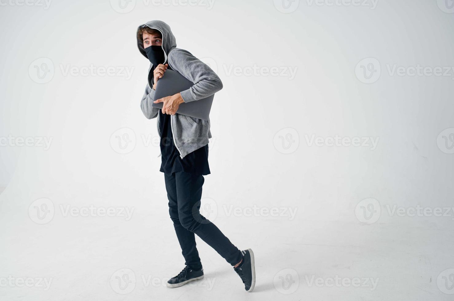 hacker hooded head hacking technology security light background photo