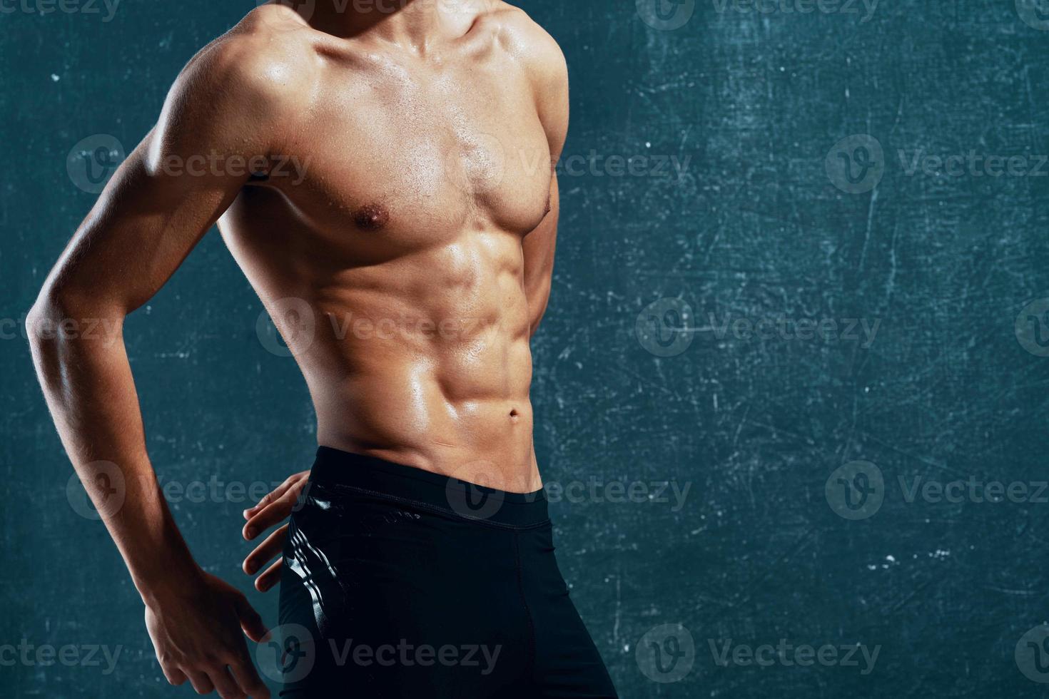 man with pumped up abs workout exercise lifestyle photo