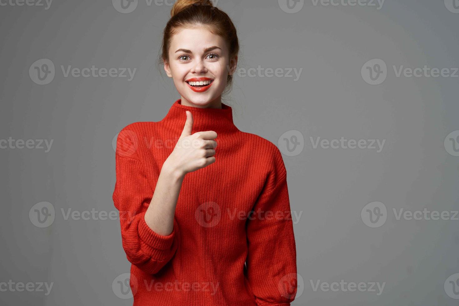 woman in red sweater glasses studio fashion lifestyle light background photo