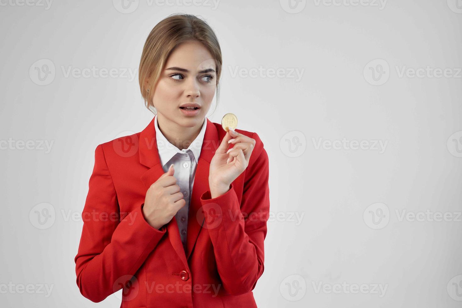 Businesswoman Bitcoin cryptocurrency in hands cropped view photo