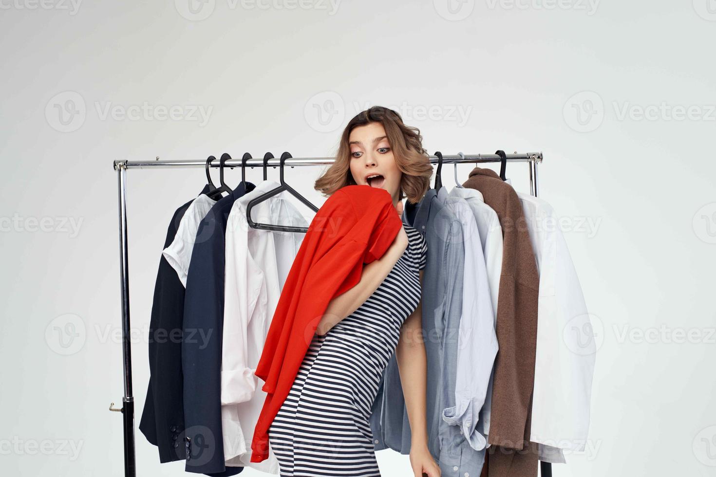 pretty woman clothes hanger shopping light background photo