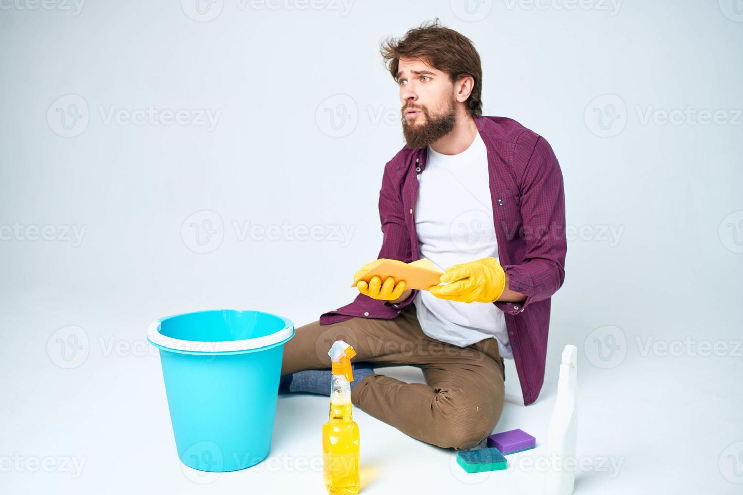 man wearing rubber gloves cleaning interior service professional photo