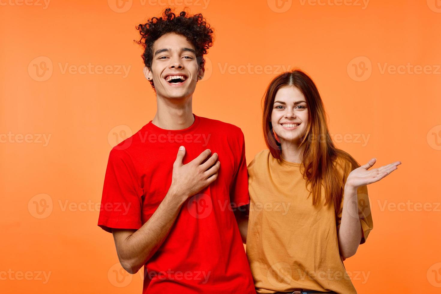 funny guy and girl in multicolored t-shirts modern style fashion photo