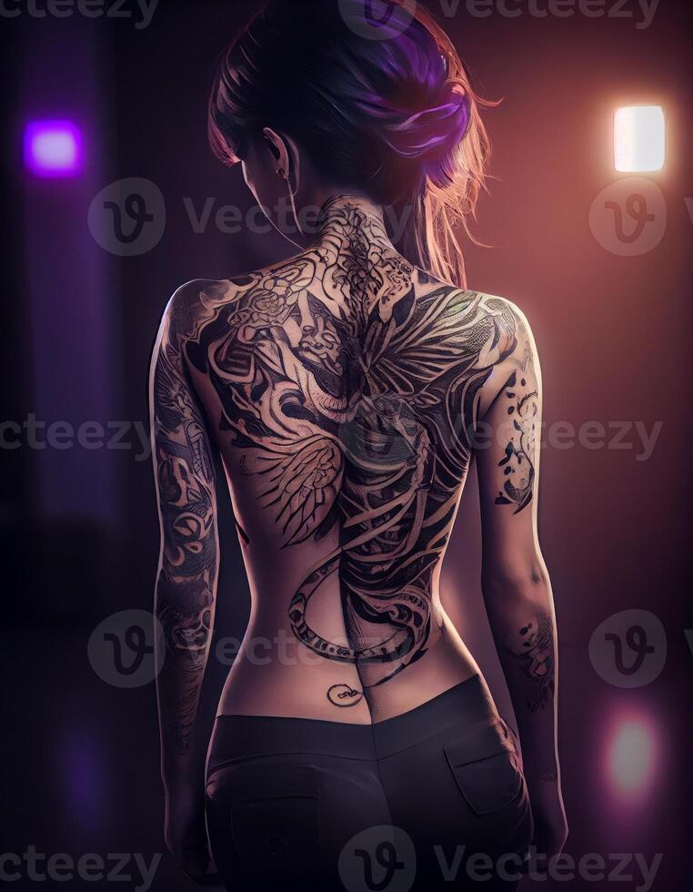 A tattooed womans sculpted full body back image photo