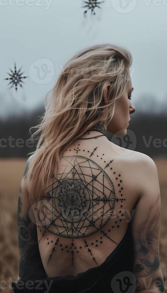 symmetrical line dots tattoo on women's back photo