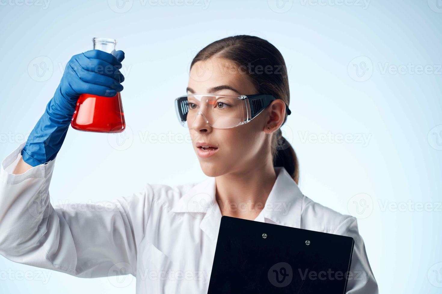 female laboratory assistant medicine diagnostics research biotechnology science photo