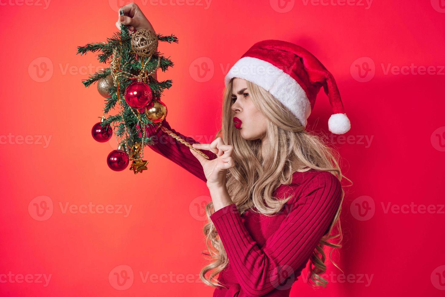 emotional woman dressed as Santa Christmas tree toys fun photo