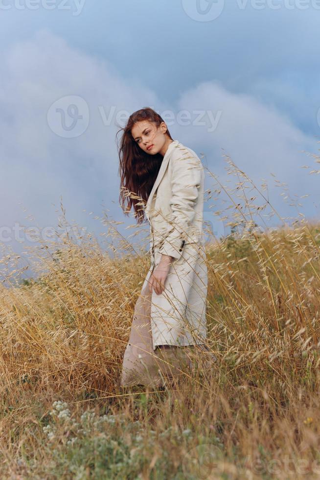 pretty woman coat outdoors walk autumn season concept photo