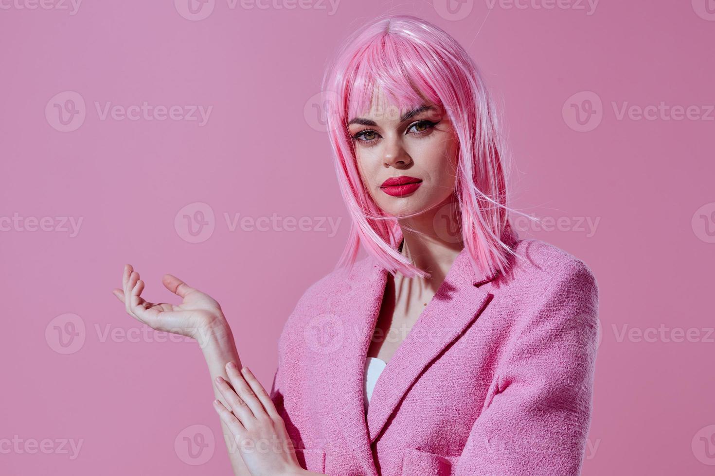 Beauty Fashion woman in a pink blazer pink wig cropped view pink background unaltered photo