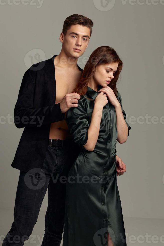 man and woman stand side by side luxury romance moda Studio elegant style photo