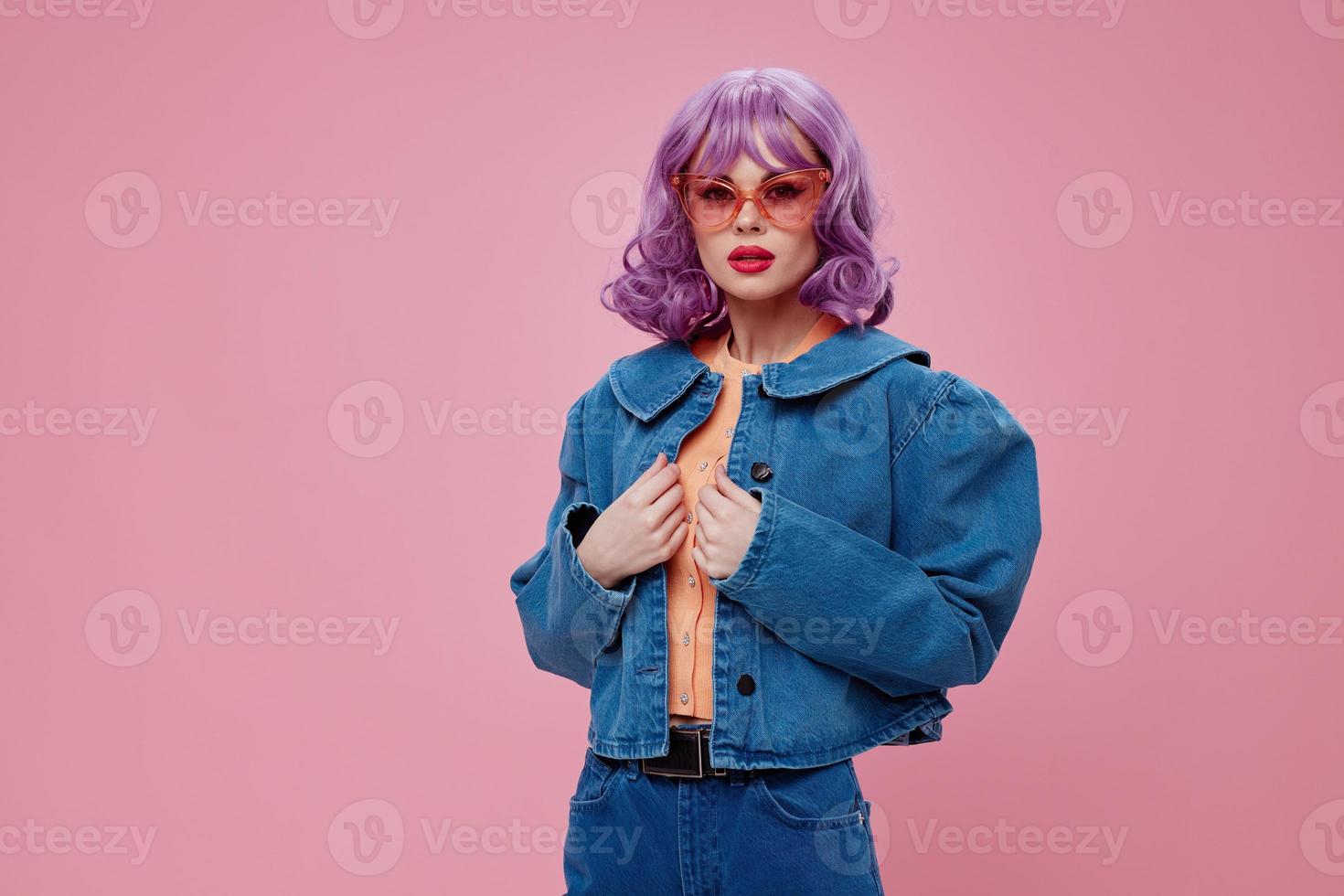 Pretty young female purple hair fashion glasses denim clothing color background unaltered photo