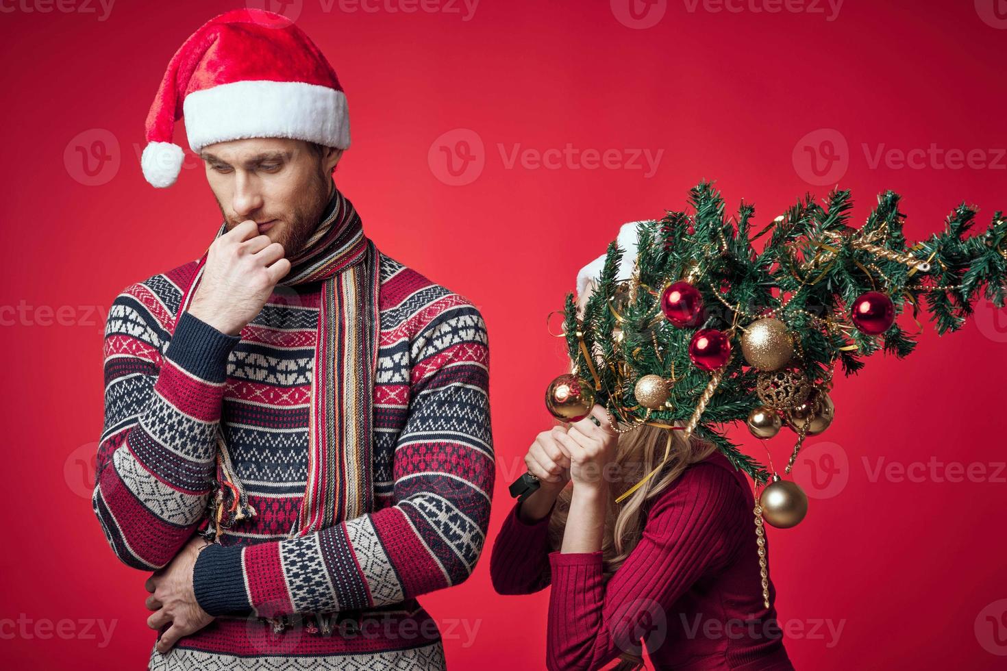 man and woman emotions displeasure christmas family photo