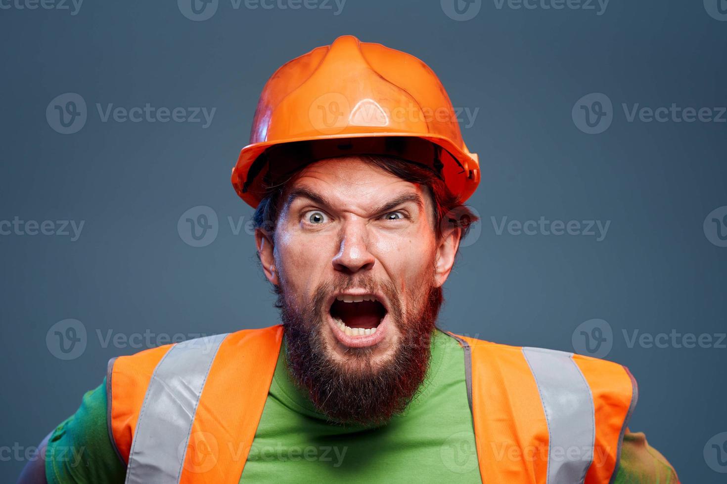 Angry worker in construction forum emotions cropped view autumn background photo