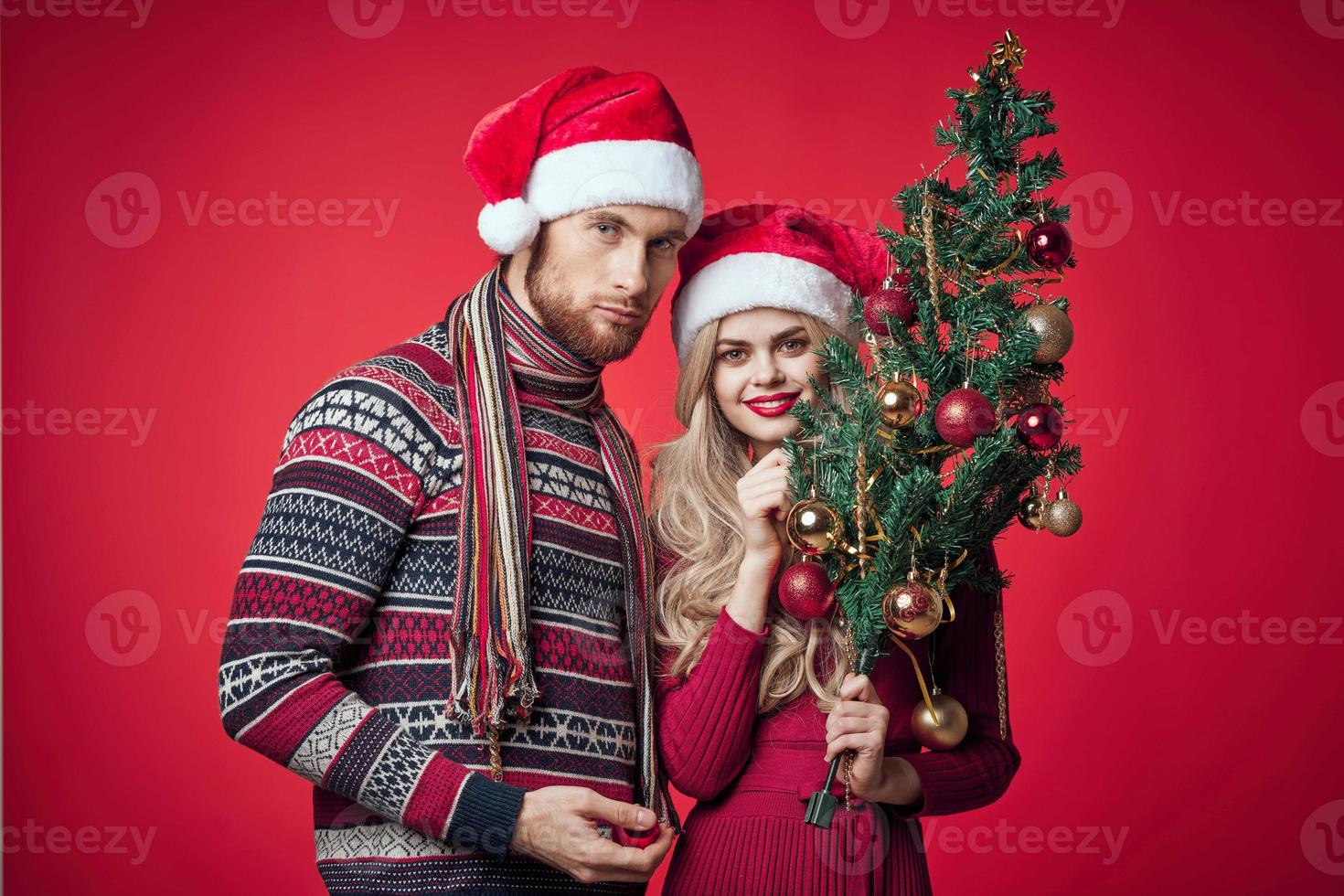 cheerful young couple holiday christmas decoration romance photo