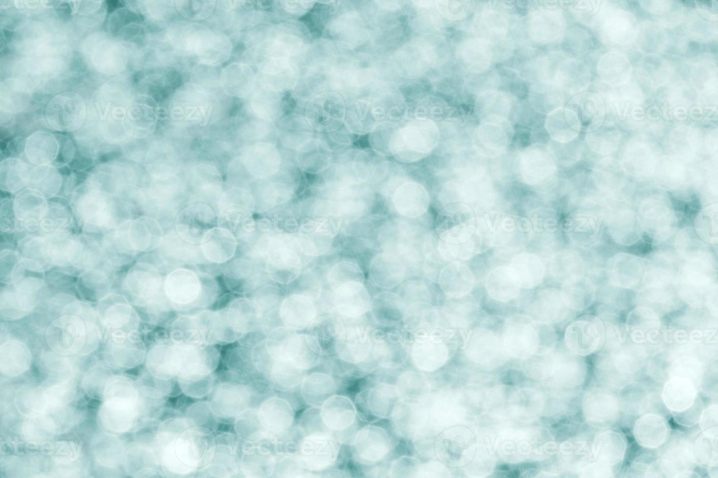 turquoise background, close up of bokeh circles photo