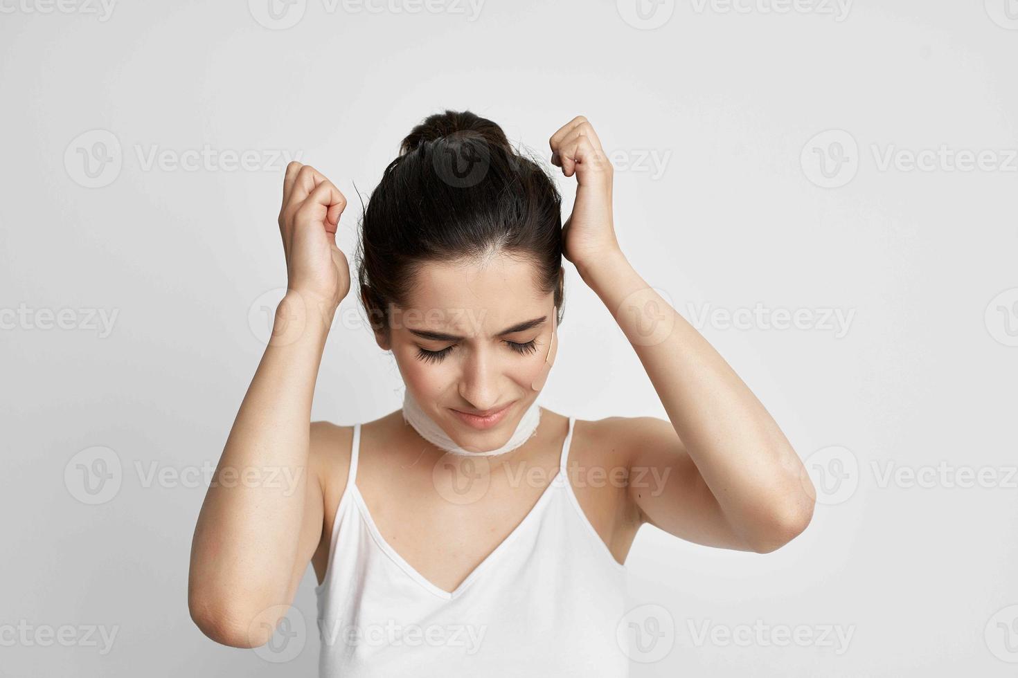 woman holding his head trauma health problems isolated background photo
