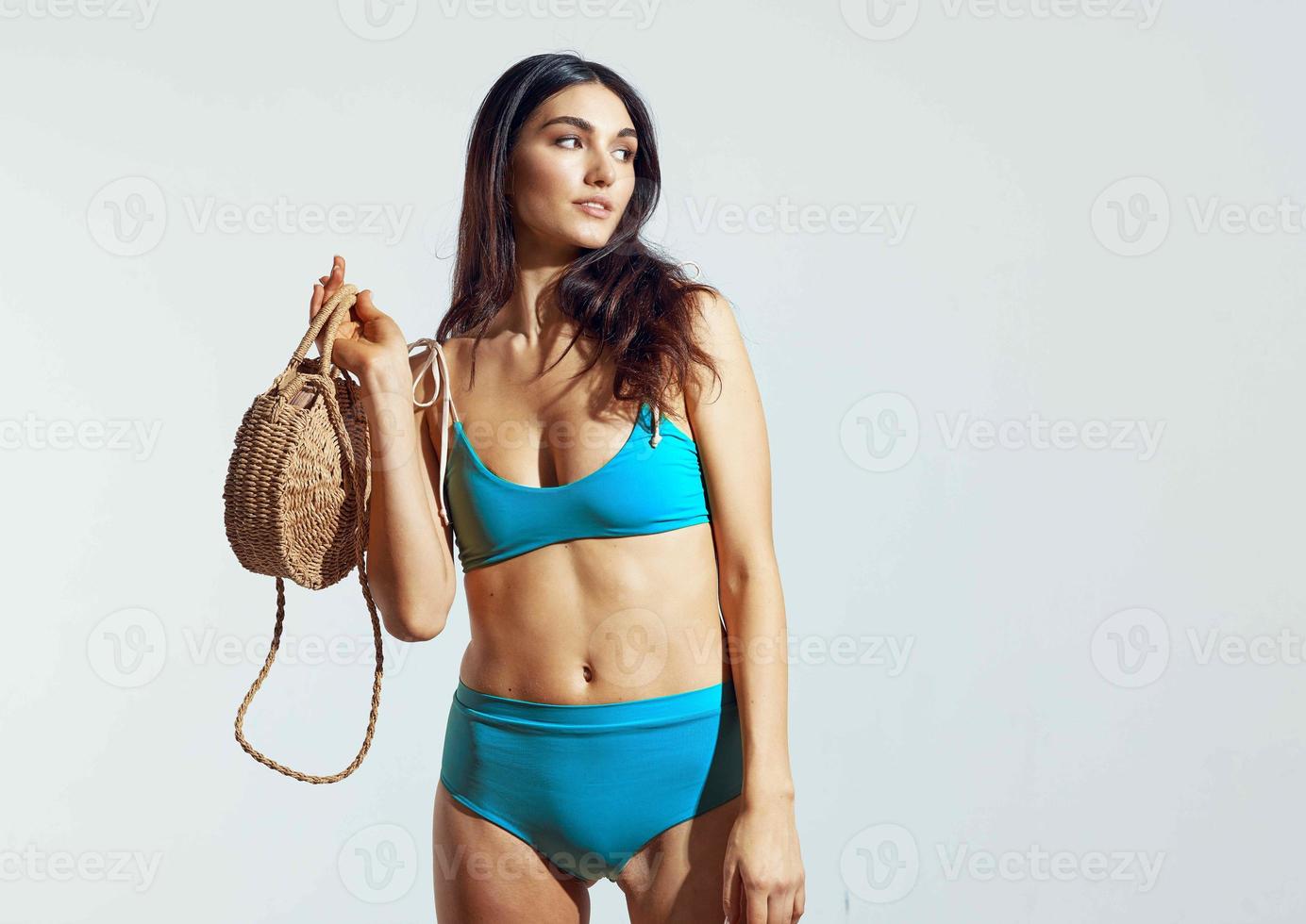 woman blue swimwear beach bag posing bikini summer photo