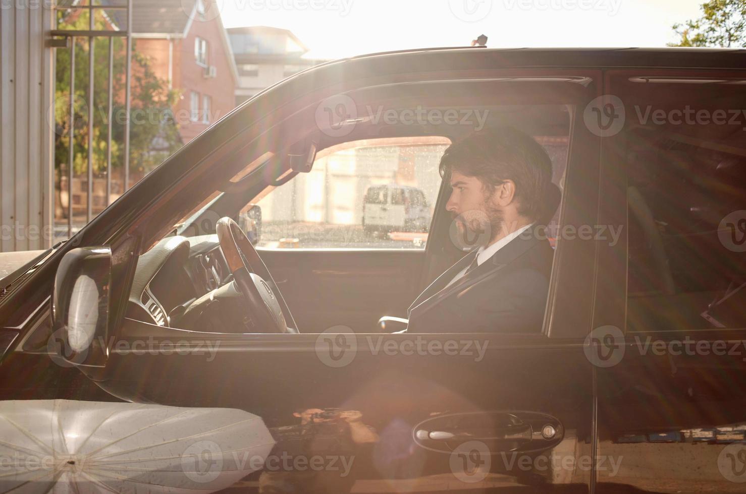 businessmen Driving a car trip luxury lifestyle success service rich photo