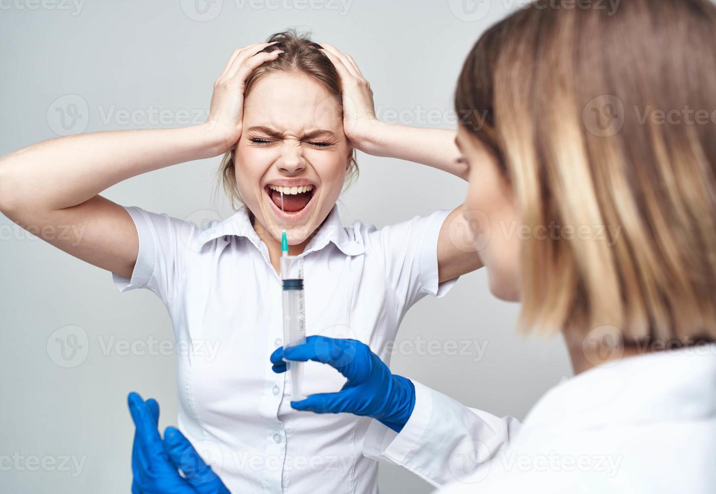 nurse with blue gloves and medicine stethoscope patient photo