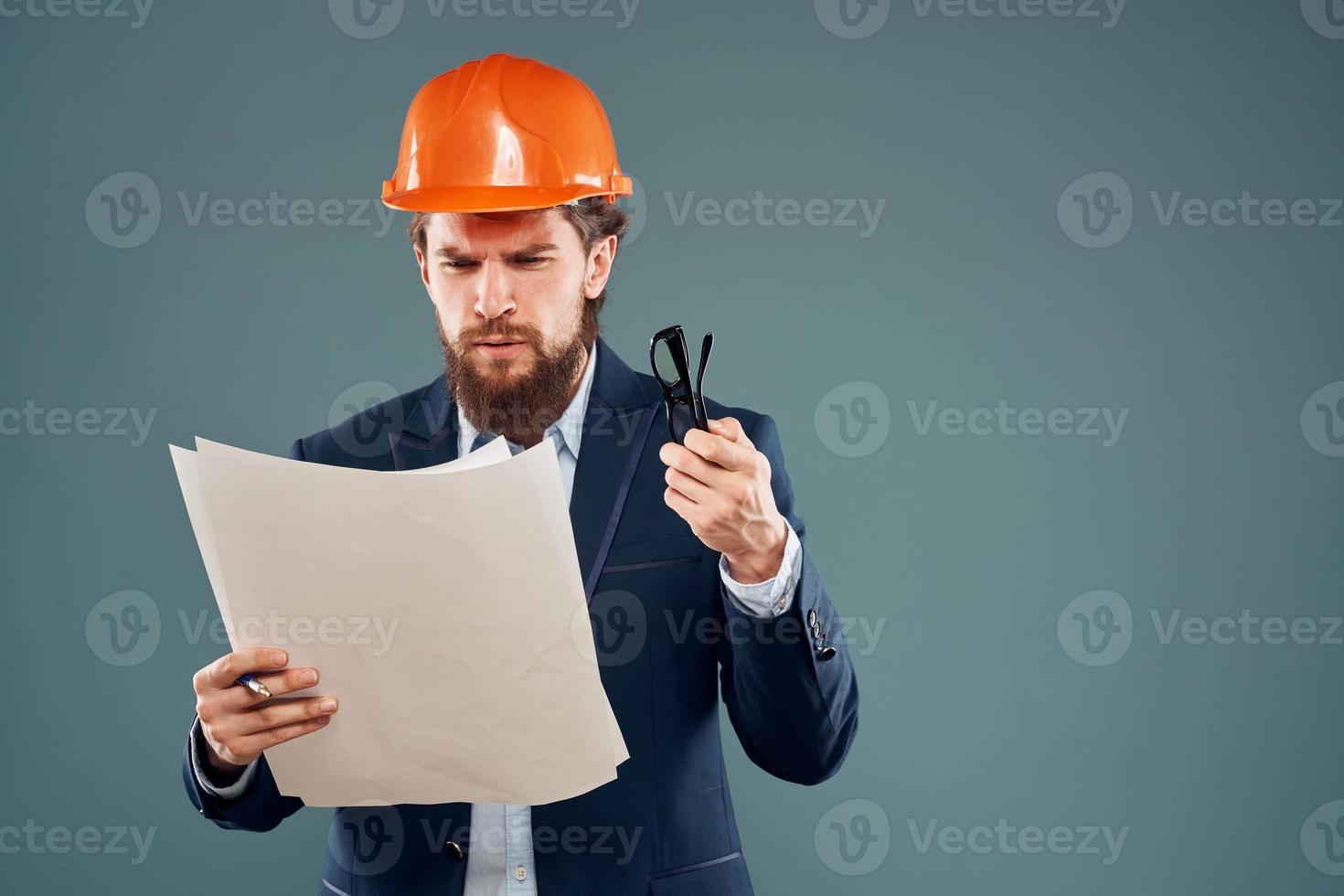 Business man blueprints engineer work professional instruction manual photo