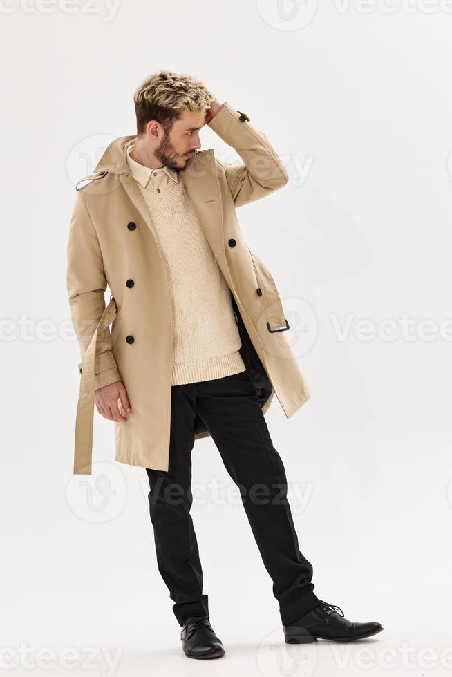 man in beige coat autumn style and lifestyle autumn clothing accessories photo