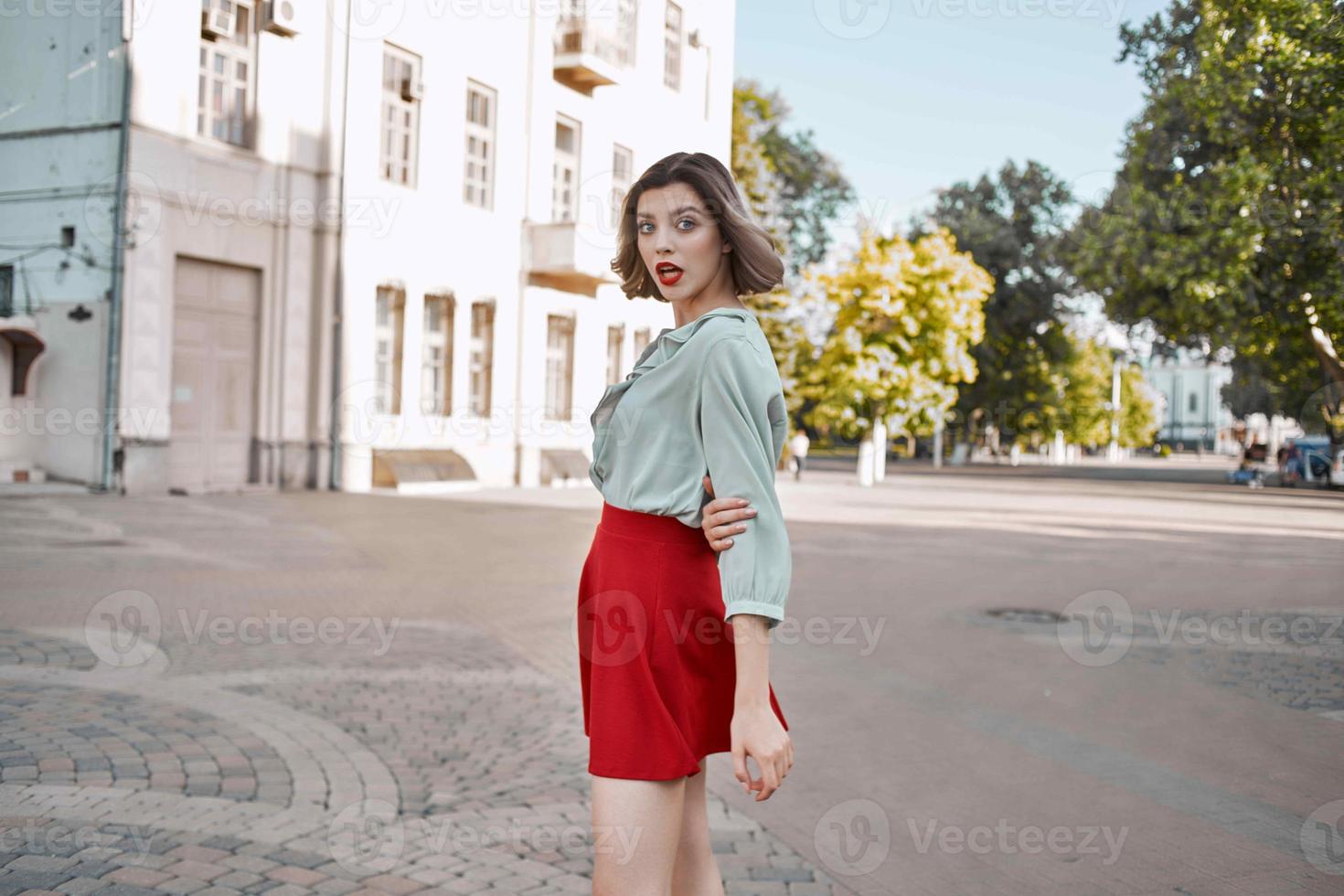 woman walking in the square outdoors leisure fun photo