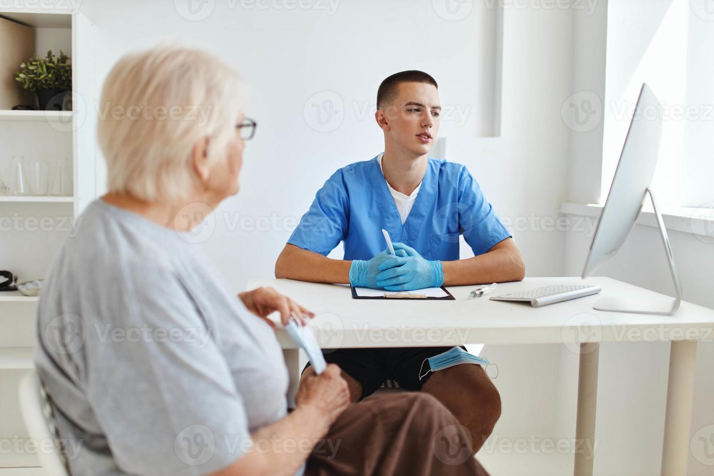 patient talking to doctor professional consultant photo