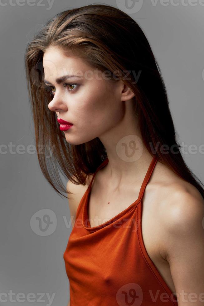 Woman looking sideways evening dress luxury cropped view photo