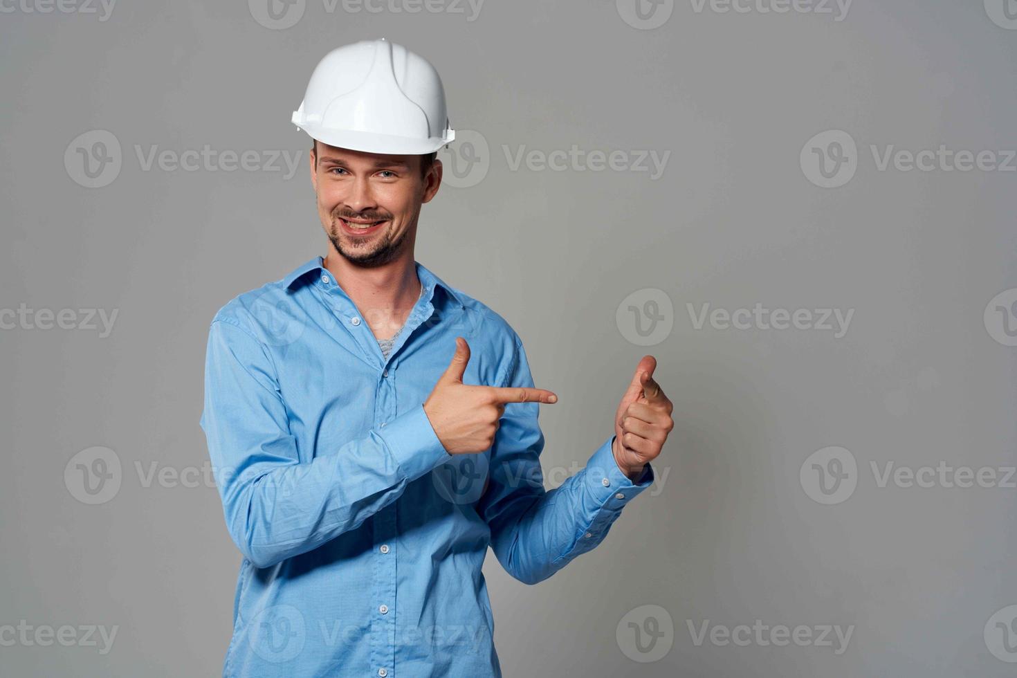 worker male engineer in white helmet emotions Professional photo