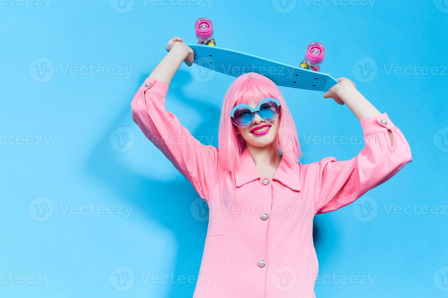 pretty woman fashion blue glasses skateboard isolated background photo