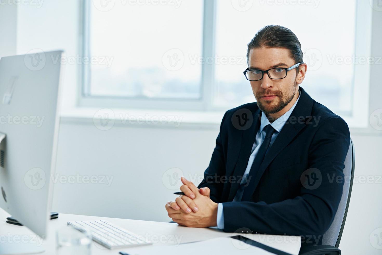 office worker an official is working at the computer executive photo