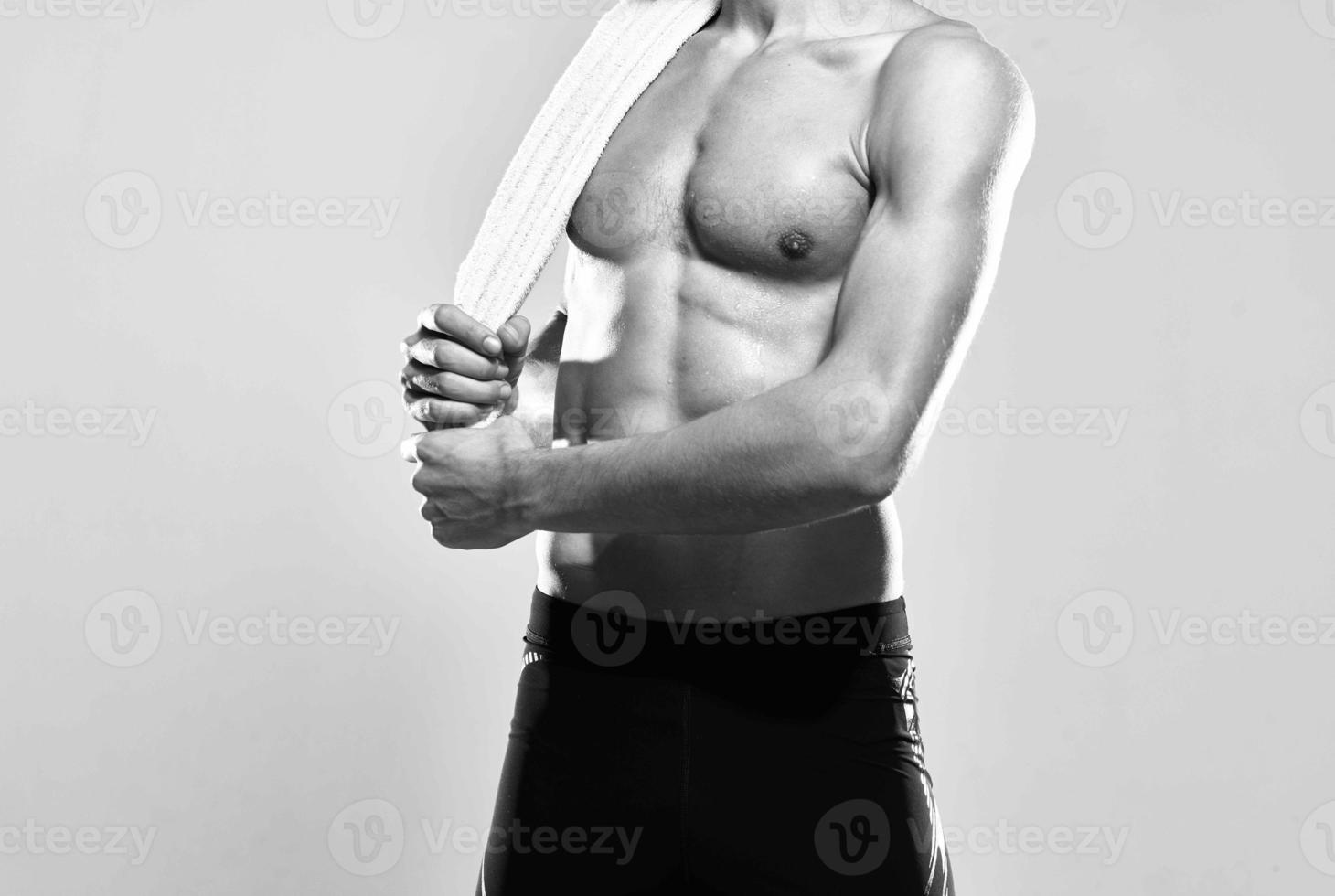 athletic man with pumped up abs motivation exercise workout photo