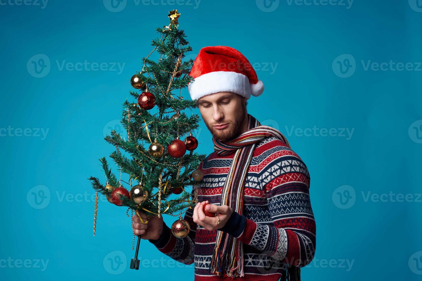 emotional man in a santa hat holding a banner holiday isolated background photo