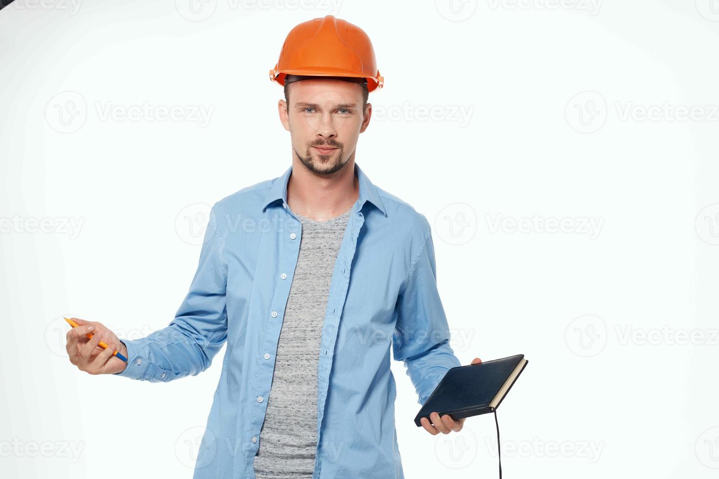 man in construction uniform Professional Job light background photo