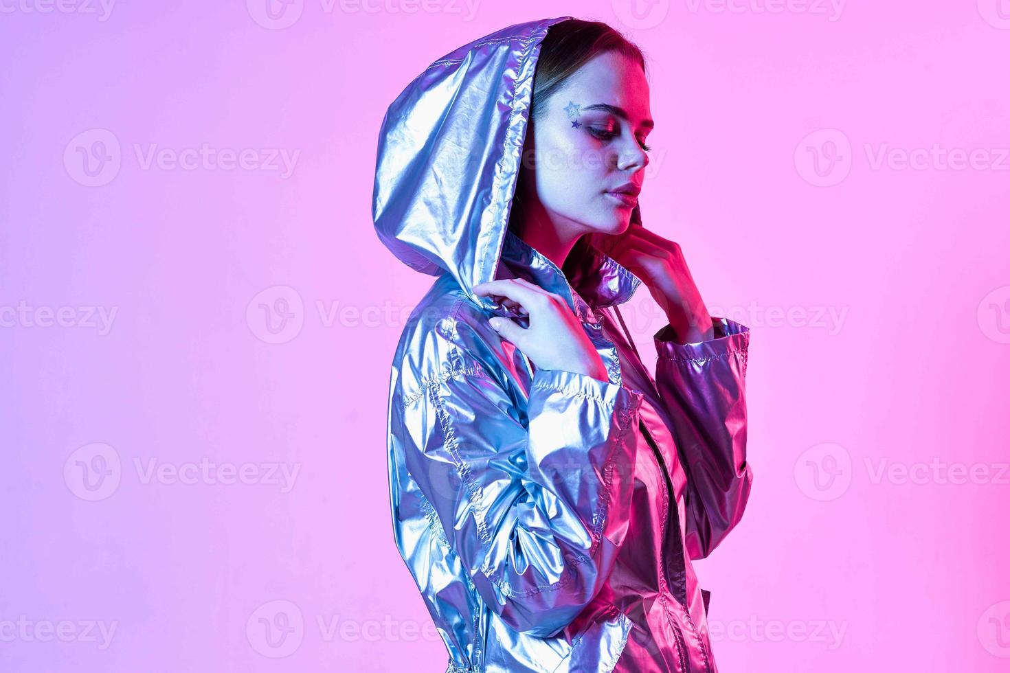 pretty woman silvery jackets modern style nightclub purple background photo