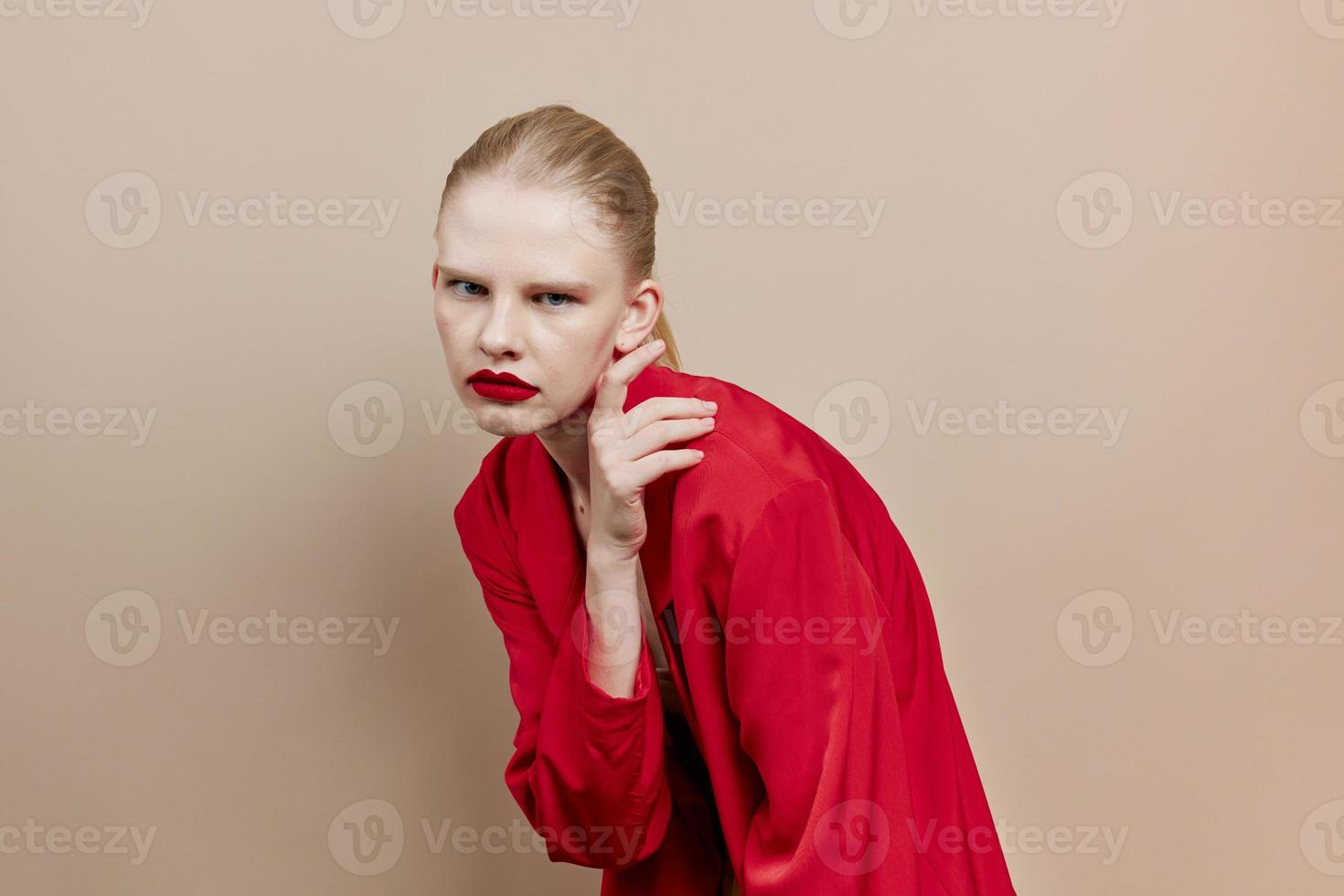 fashionable woman makeup in red jacket studio model unaltered photo