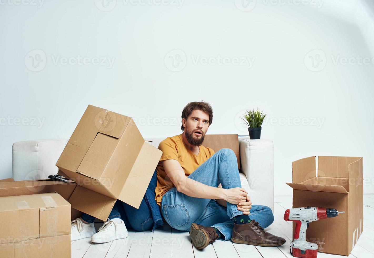 Man and woman with empty boxes Moving to an apartment indoor interior photo