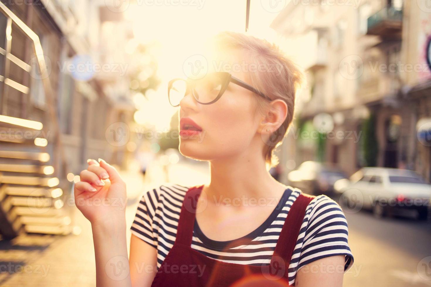 woman with glasses cosmetics and police on the street walk photo