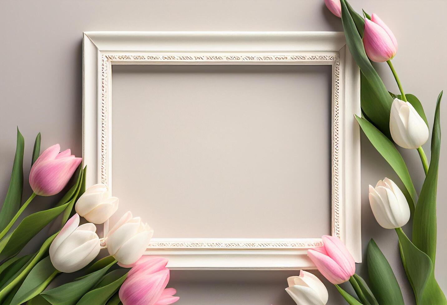 White frame with pink tulips on gray background. Copy space. photo