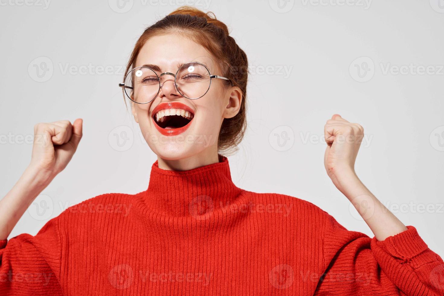 pretty woman with glasses posing light background photo