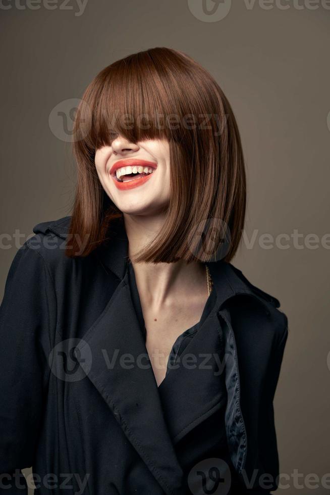 Side view romantic woman European appearance black coat photo