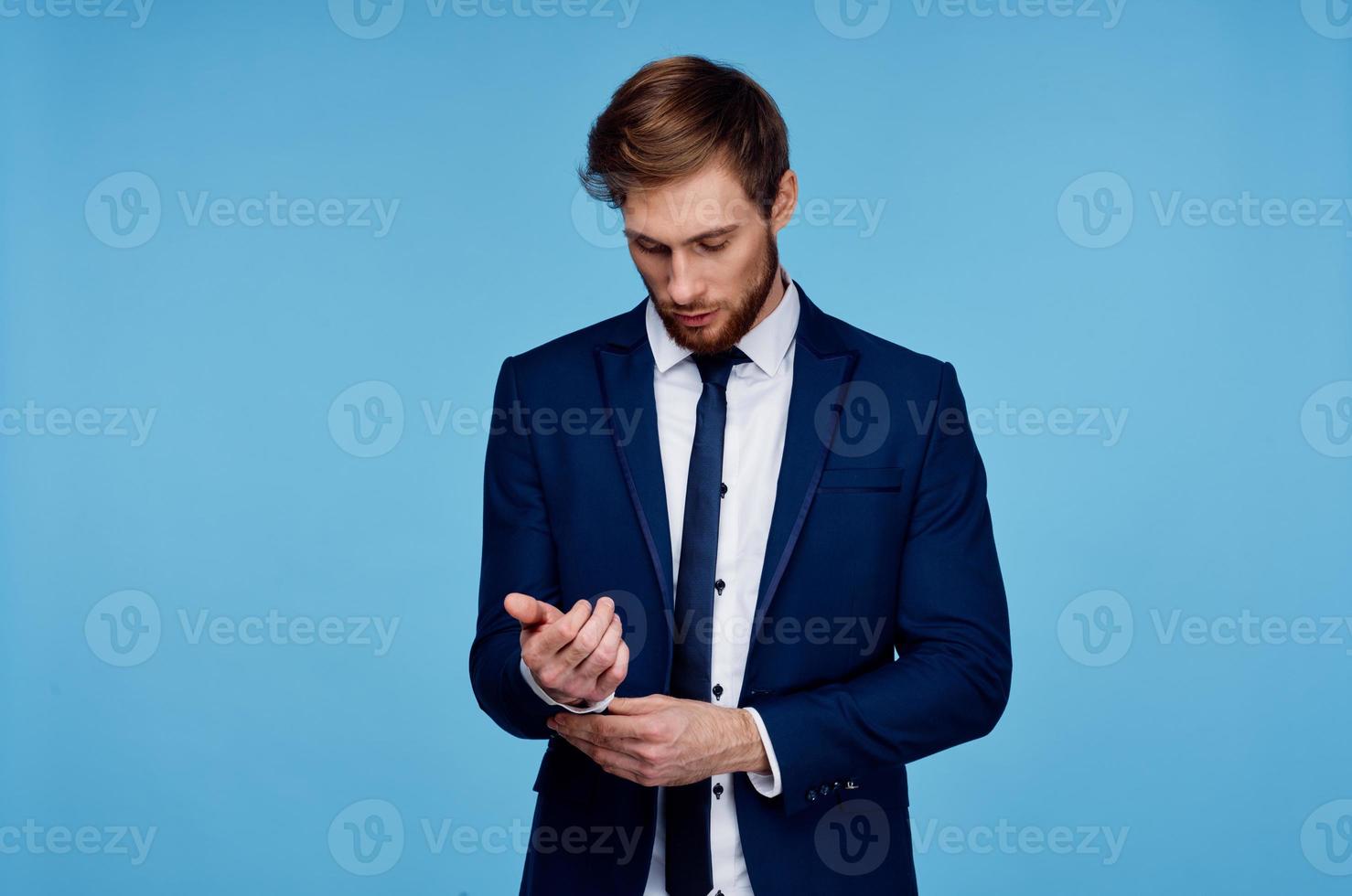 business man cropped view blue background studio finance photo